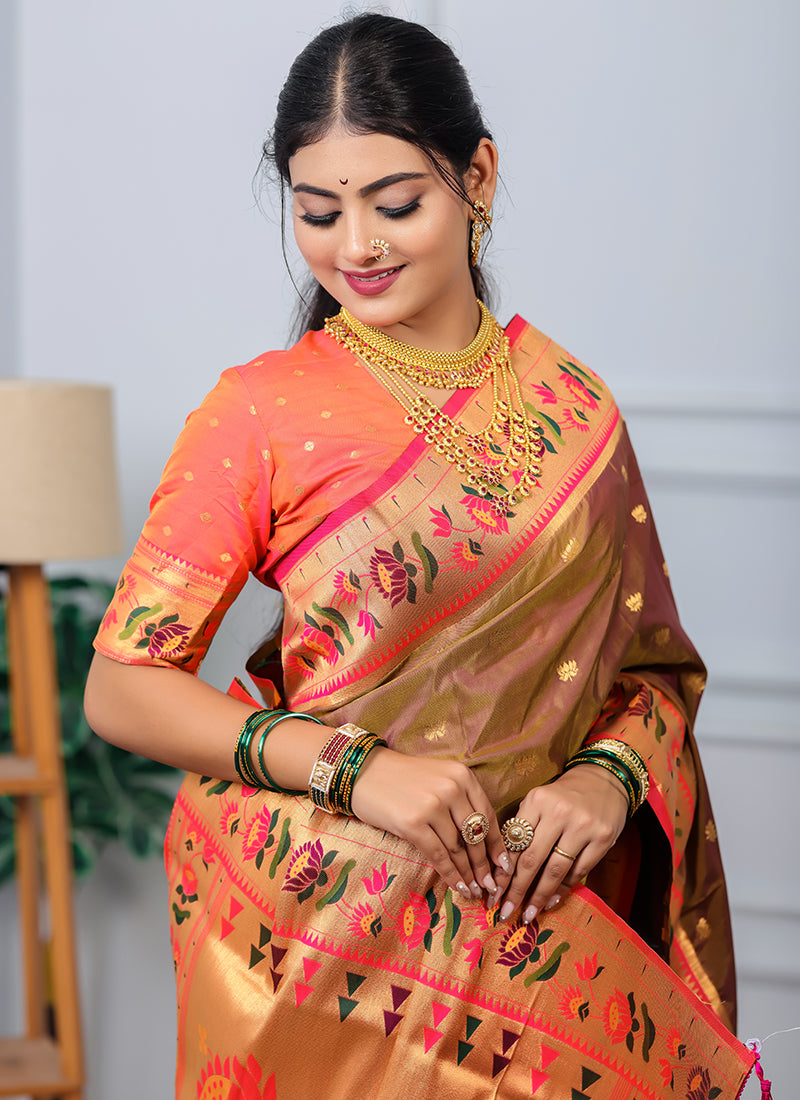 Traditional paithani saree look in brown silk with pink-golden tissue border, colorful floral and peacock motifs, styled with gold jewelry