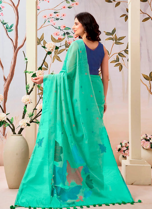 Woman wearing a pure Mul cotton saree showcasing its soft and lightweight fabric, ideal for comfortable daily wear.