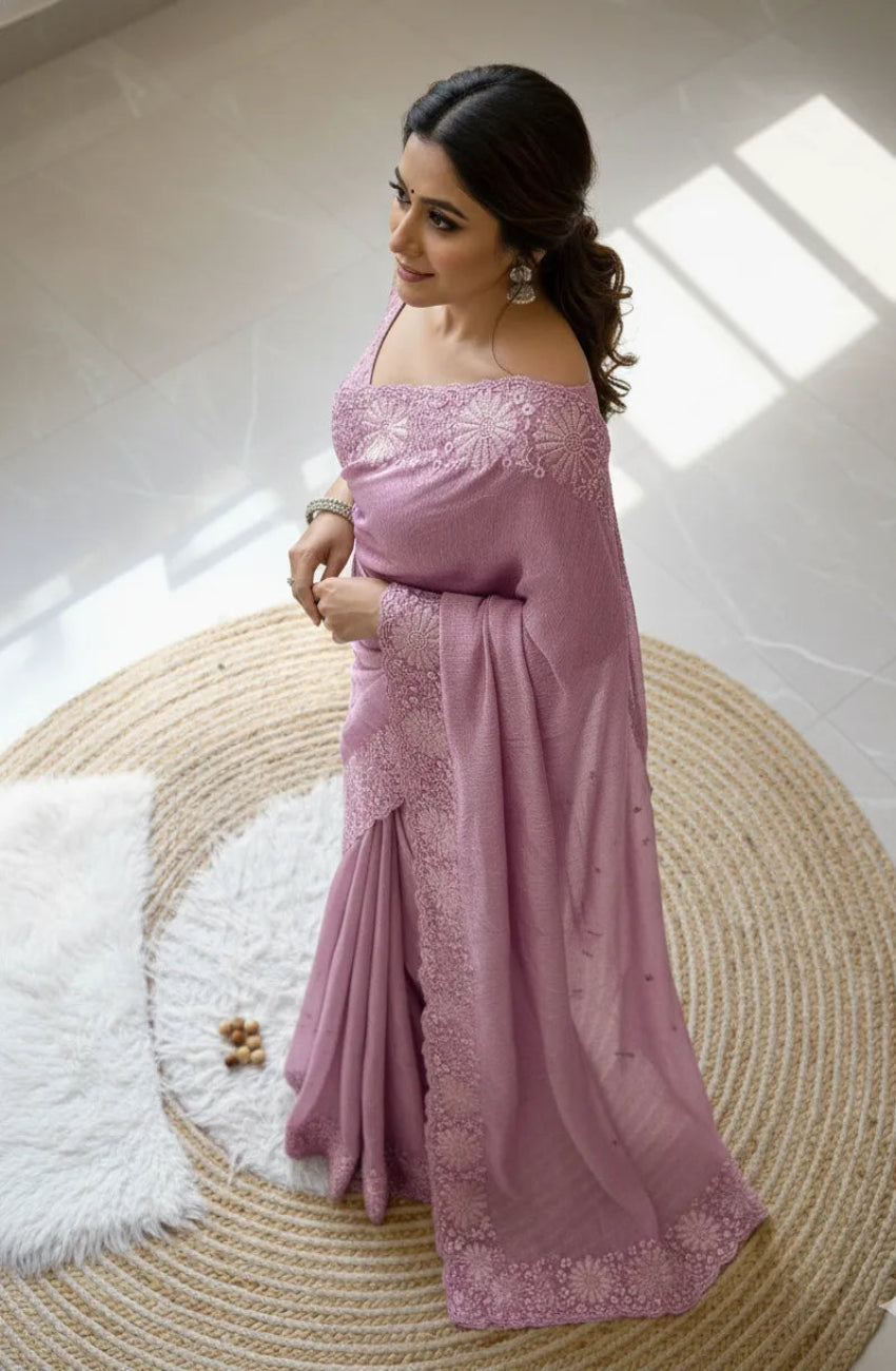 Beautiful woman wearing a stylish chiffon saree showcasing lightweight fabric and elegant drape