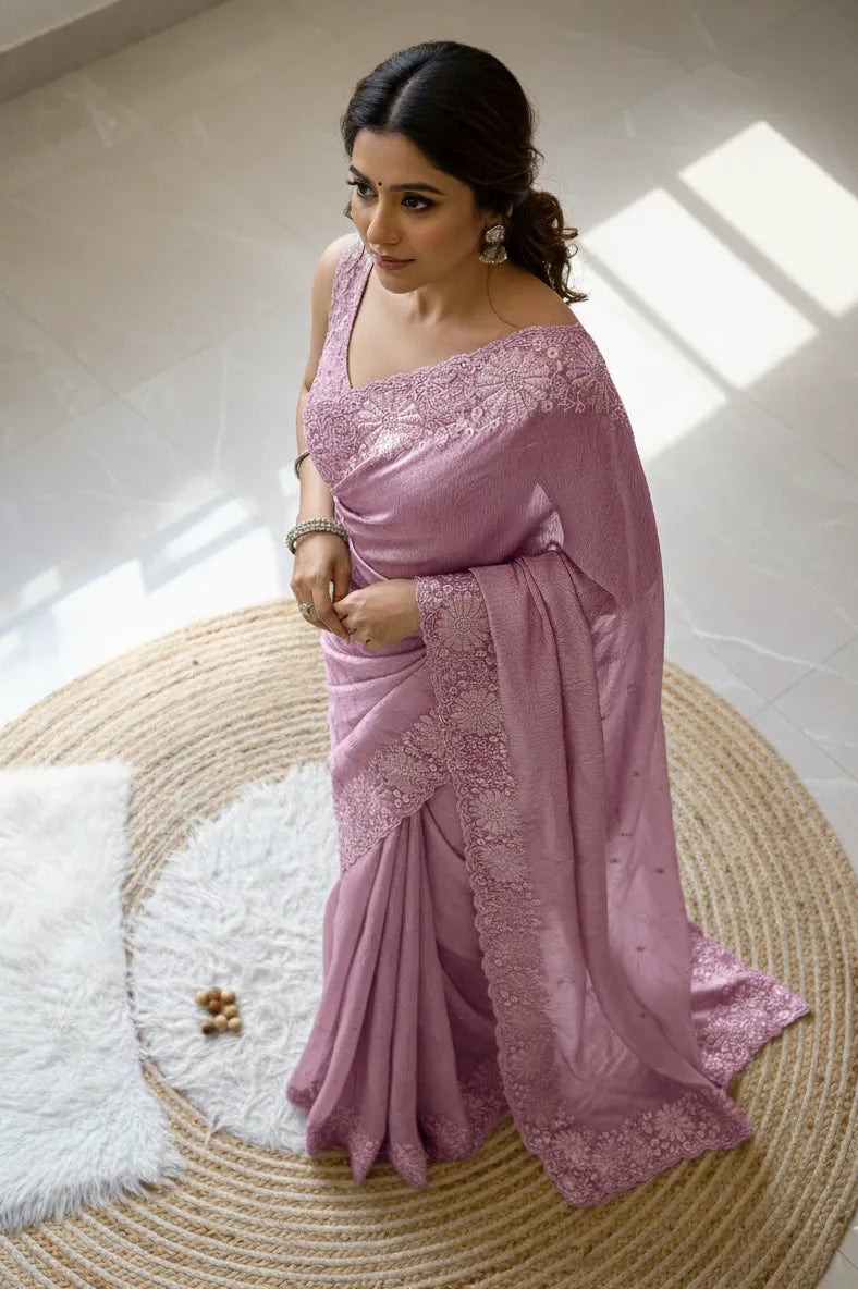 Beautiful woman wearing a stylish chiffon saree showcasing lightweight fabric and elegant drape