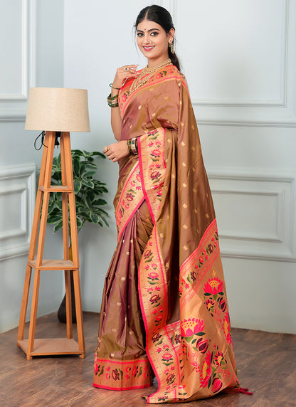 Traditional paithani saree look in brown silk with pink-golden tissue border, colorful floral and peacock motifs, styled with gold jewelry