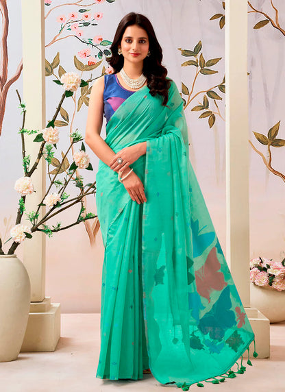 Woman wearing a pure Mul cotton saree showcasing its soft and lightweight fabric, ideal for comfortable daily wear.