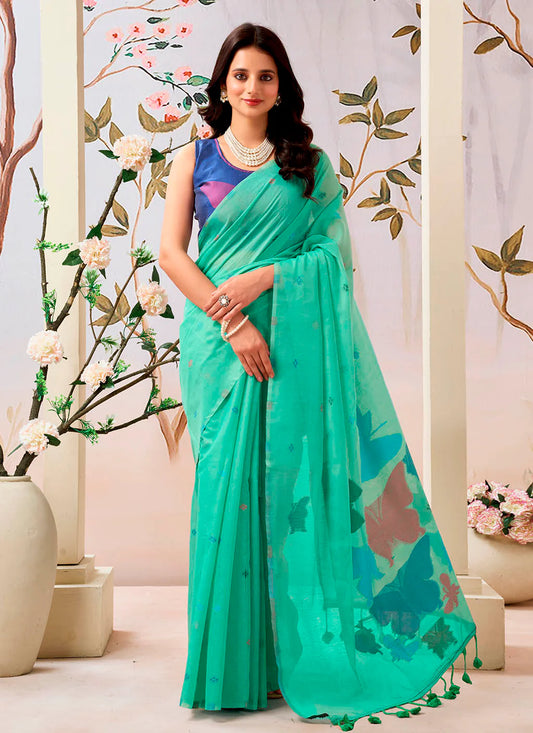 Woman wearing a pure Mul cotton saree showcasing its soft and lightweight fabric, ideal for comfortable daily wear.