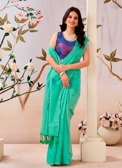 Woman wearing a pure Mul cotton saree showcasing its soft and lightweight fabric, ideal for comfortable daily wear.