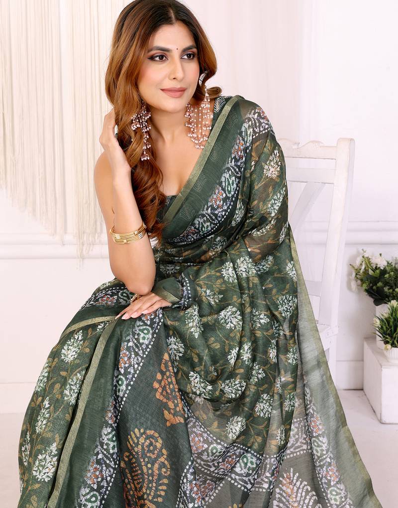 Green woven cotton silk saree with blouse piece