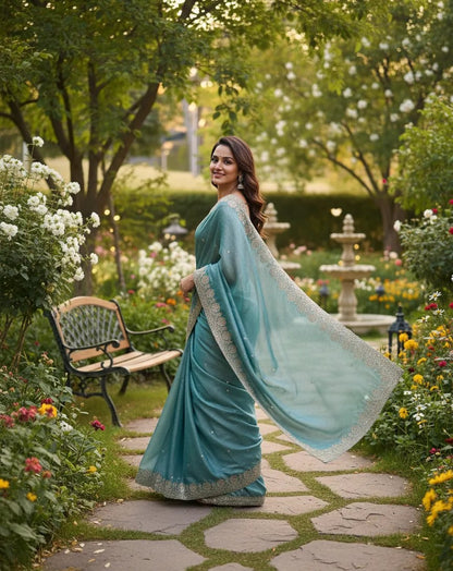 Beautiful woman wearing a stylish siffon saree with soft, flowy fabric and elegant design, perfect for festive and party occasions.