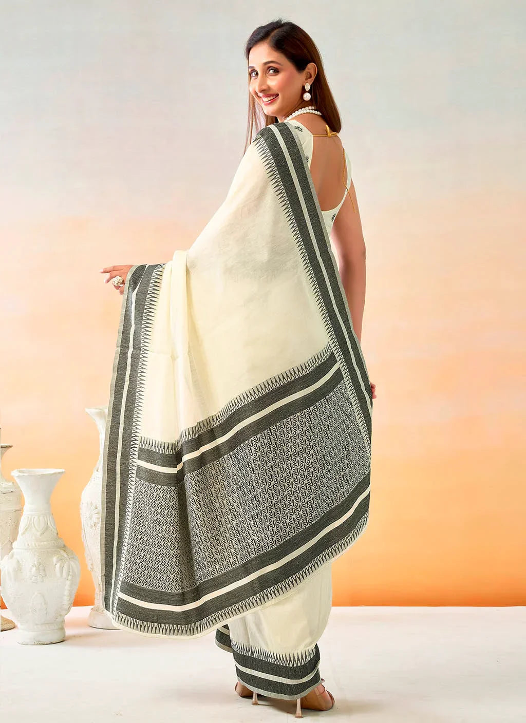 Soft and breathable spun cotton fabric in natural texture, ideal for everyday wear and comfort.