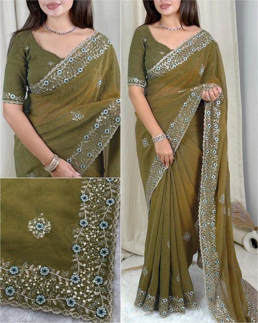 Woman wearing a shimmering tissue saree with a soft, flowing texture, ideal for festive and special occasions.