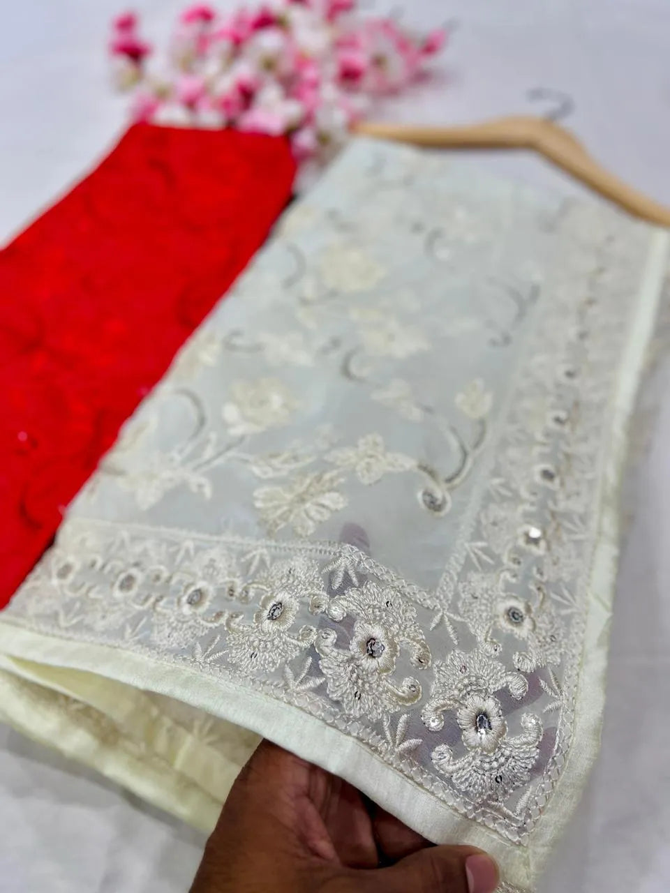Beautiful woman wearing a stylish georgette saree with soft, flowy fabric and elegant design, perfect for festive and party occasions.