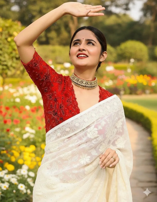 Beautiful woman wearing a stylish georgette saree with soft, flowy fabric and elegant design, perfect for festive and party occasions.