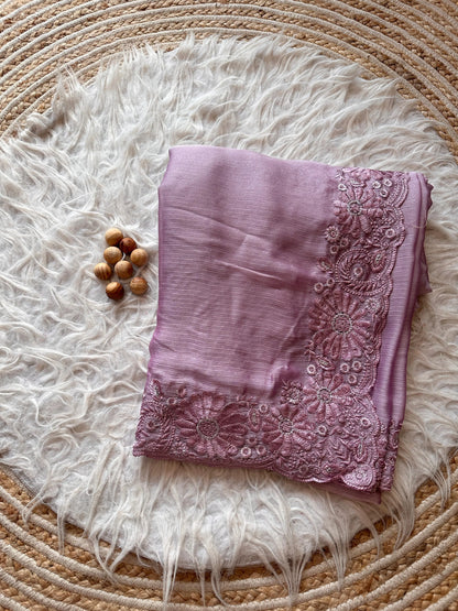 Beautiful woman wearing a stylish chiffon saree showcasing lightweight fabric and elegant drape