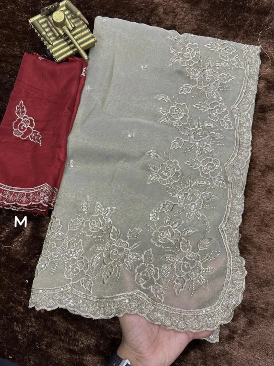Elegant embroidered saree for women featuring intricate design and premium fabric, perfect for weddings, parties, and festive celebrations.