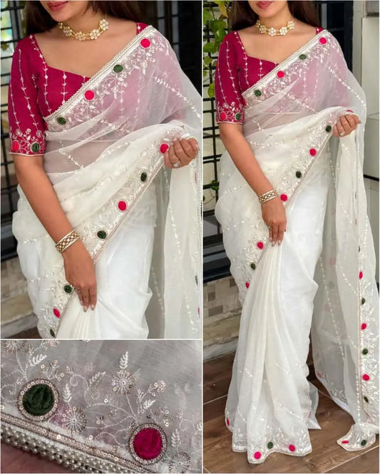 White crush saree with embroidered net overlay and designer magenta blouse featuring mirror work border