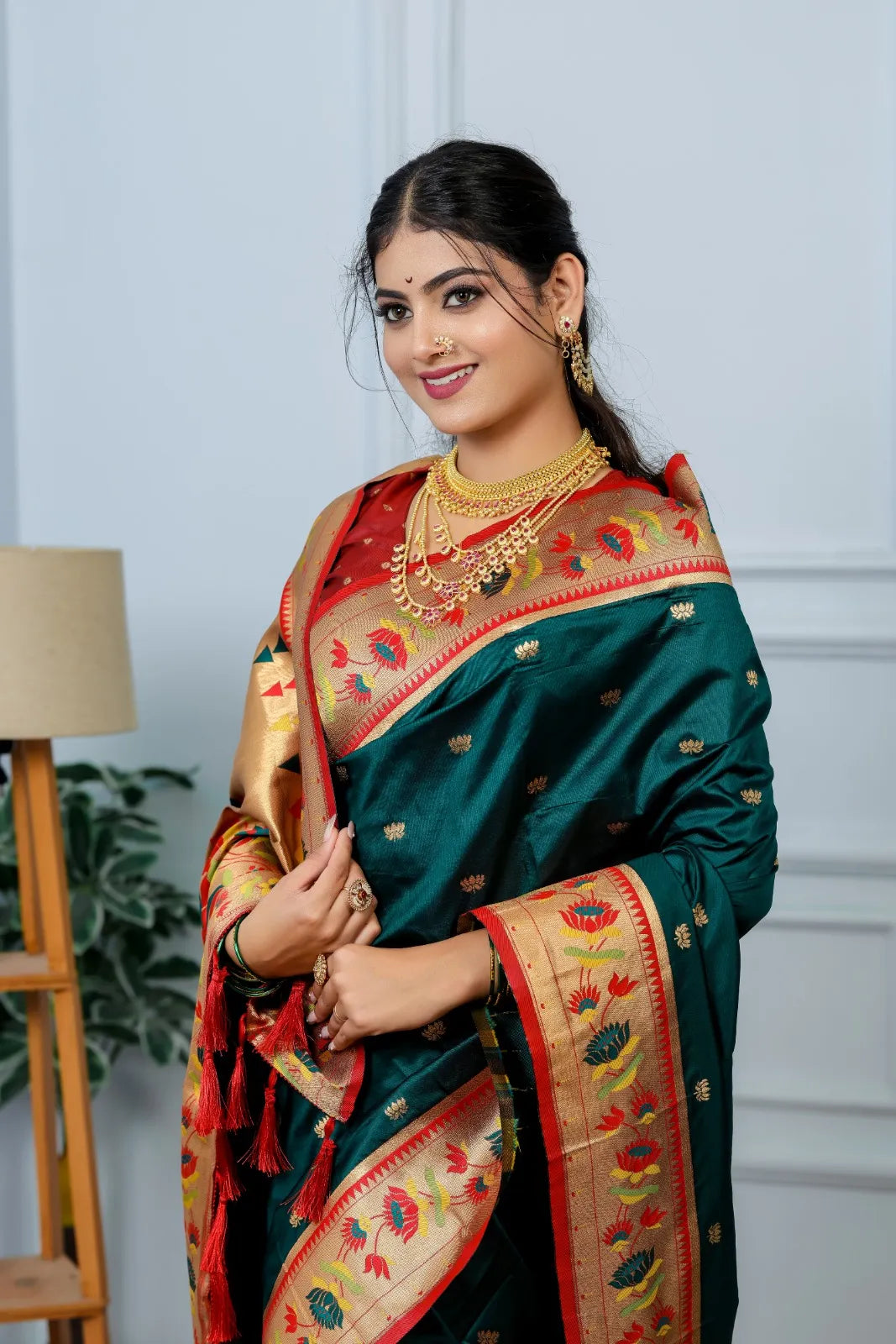 Paithani saree look in green with red golden border and jewelry