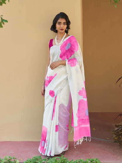 Beautiful woman wearing a stylish linen digital print saree with vibrant floral design